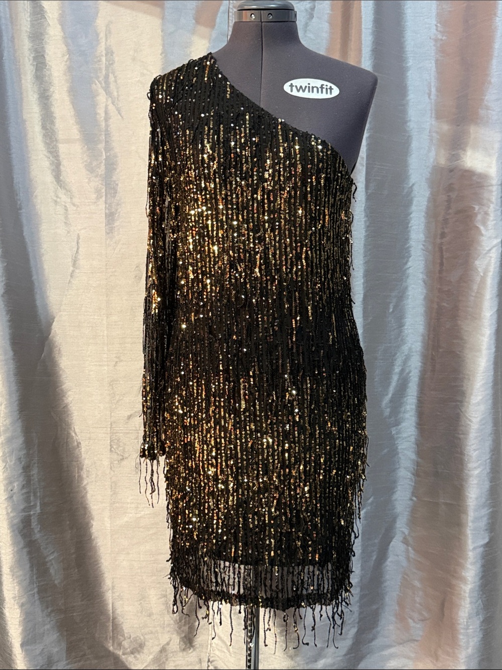 Fashion Nova Black and Gold One-Shoulder Sequin Fringe Dress